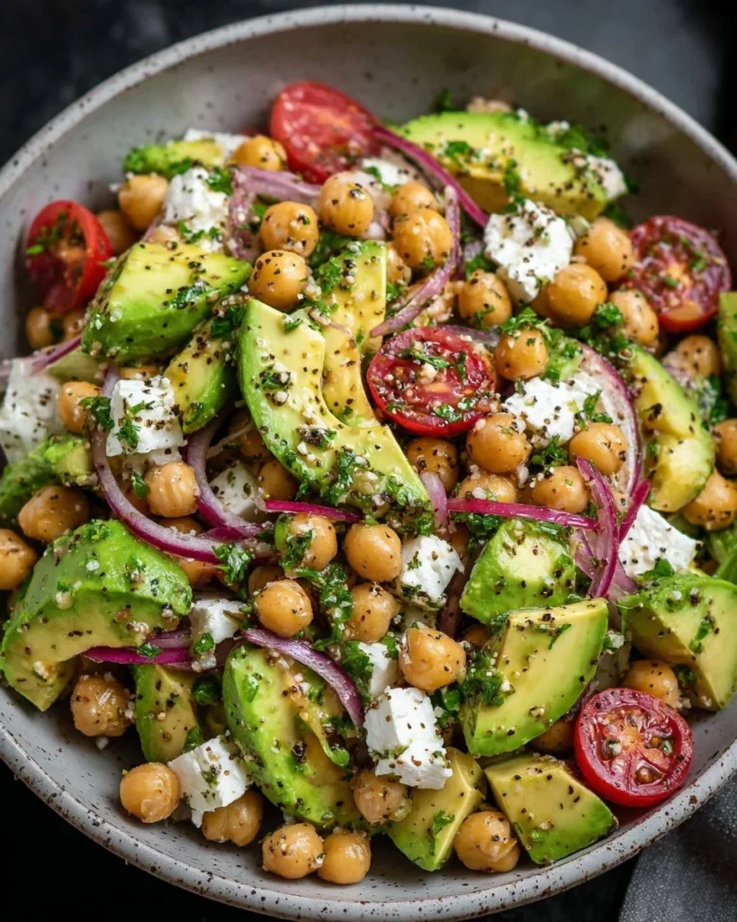 Chickpea Feta Avocado Salad garnished with fresh ingredients