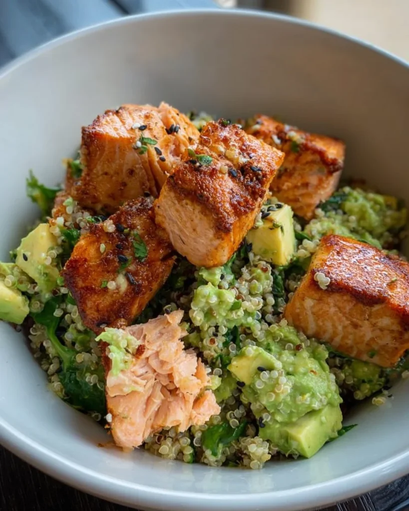 Delicious Salmon Quinoa Bowl with Lemon Feta Avocado Salsa