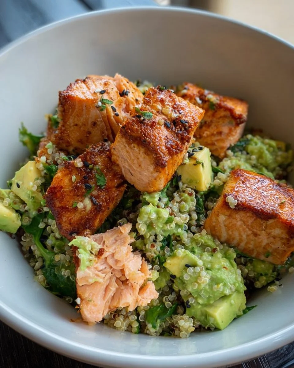 Delicious Salmon Quinoa Bowl with Lemon Feta Avocado Salsa